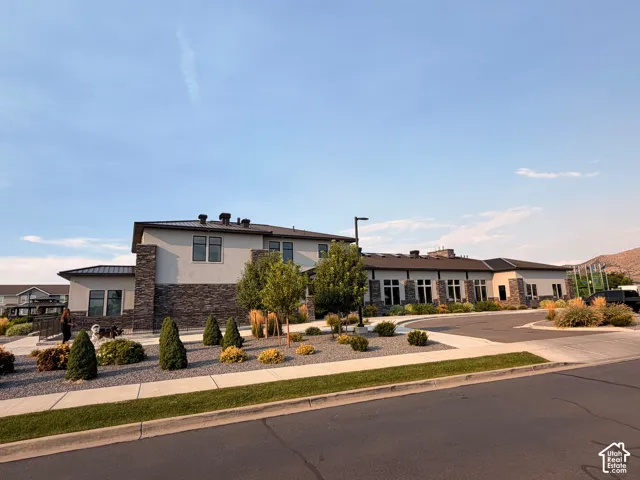HOA Clubhouse - Contemporary exterior with stone veneer and stucco finishes