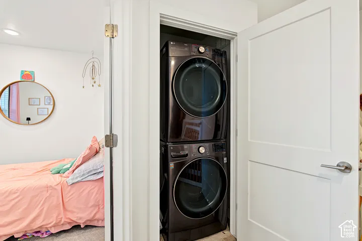 Integrated stacked washer and dryer unit