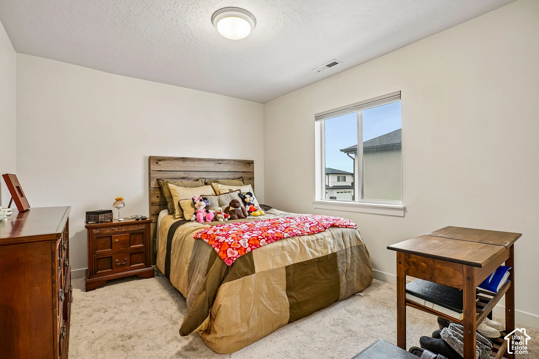 Recessed window with white trim, wall-to-wall carpeting, and a flush mount ceiling light fixture