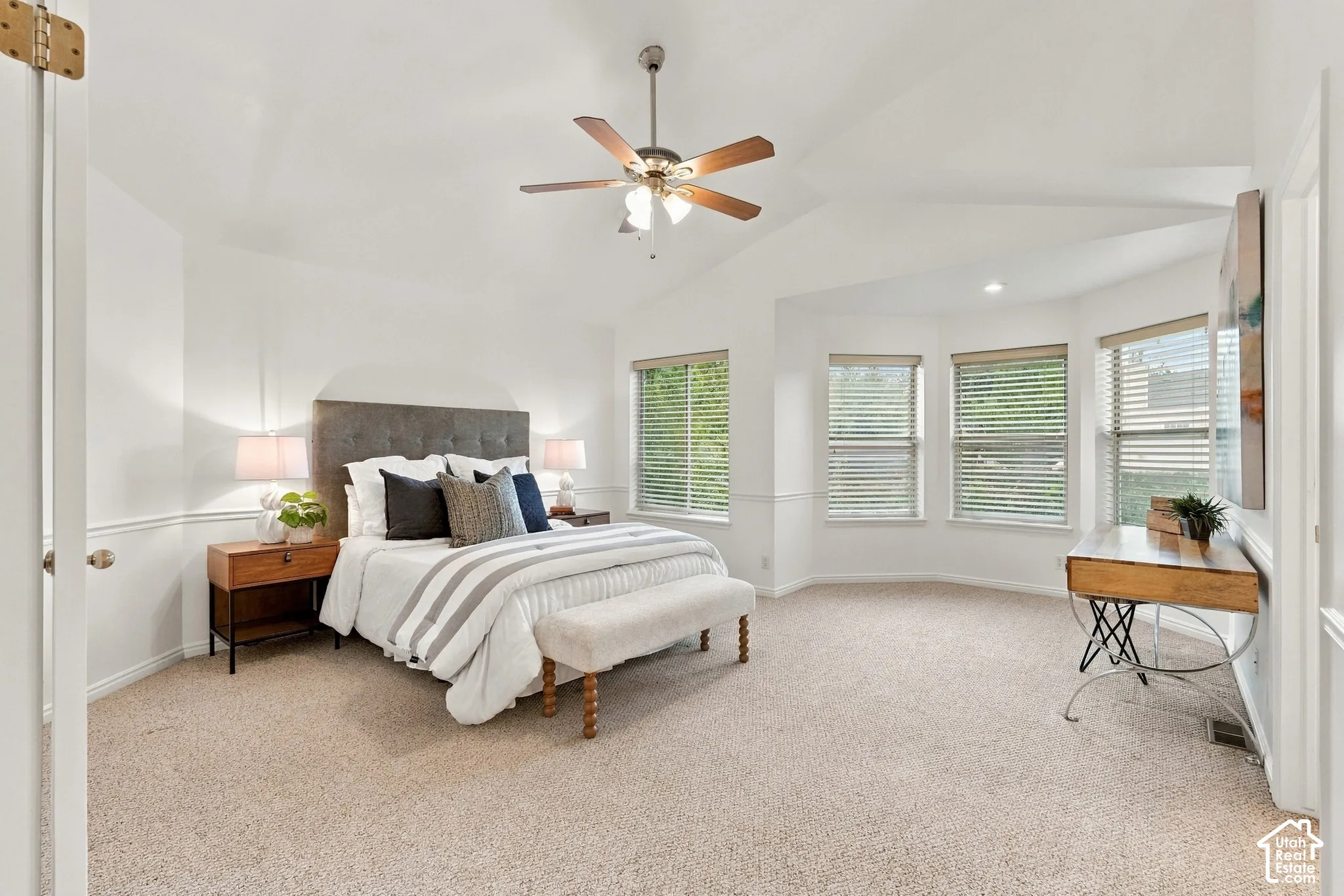 Primary bedroom with large windows and views of Mt. Olympus