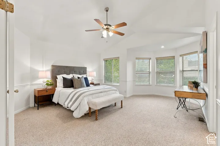 Primary bedroom with large windows and views of Mt. Olympus
