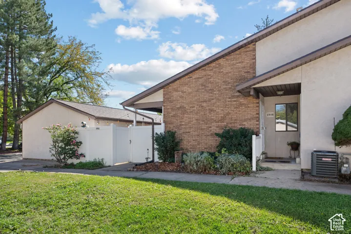 Brick and stucco exterior with a covered entry