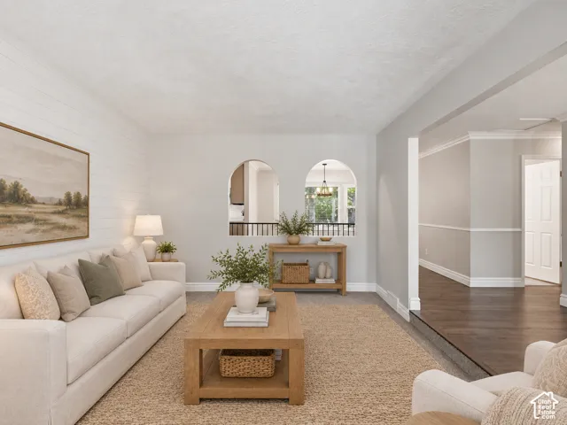 White shiplap accent wall with a neutral color palette