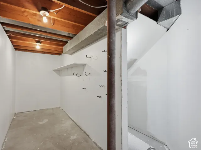 Exposed wood beam ceiling with recessed lighting