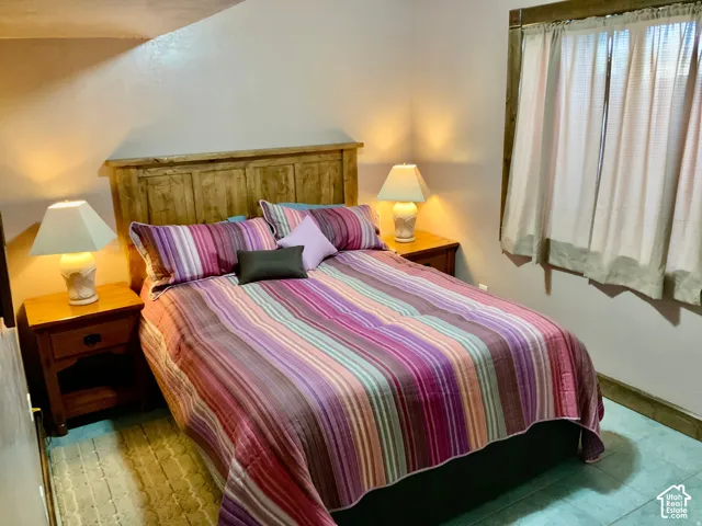 Wood headboard with matching wood nightstands