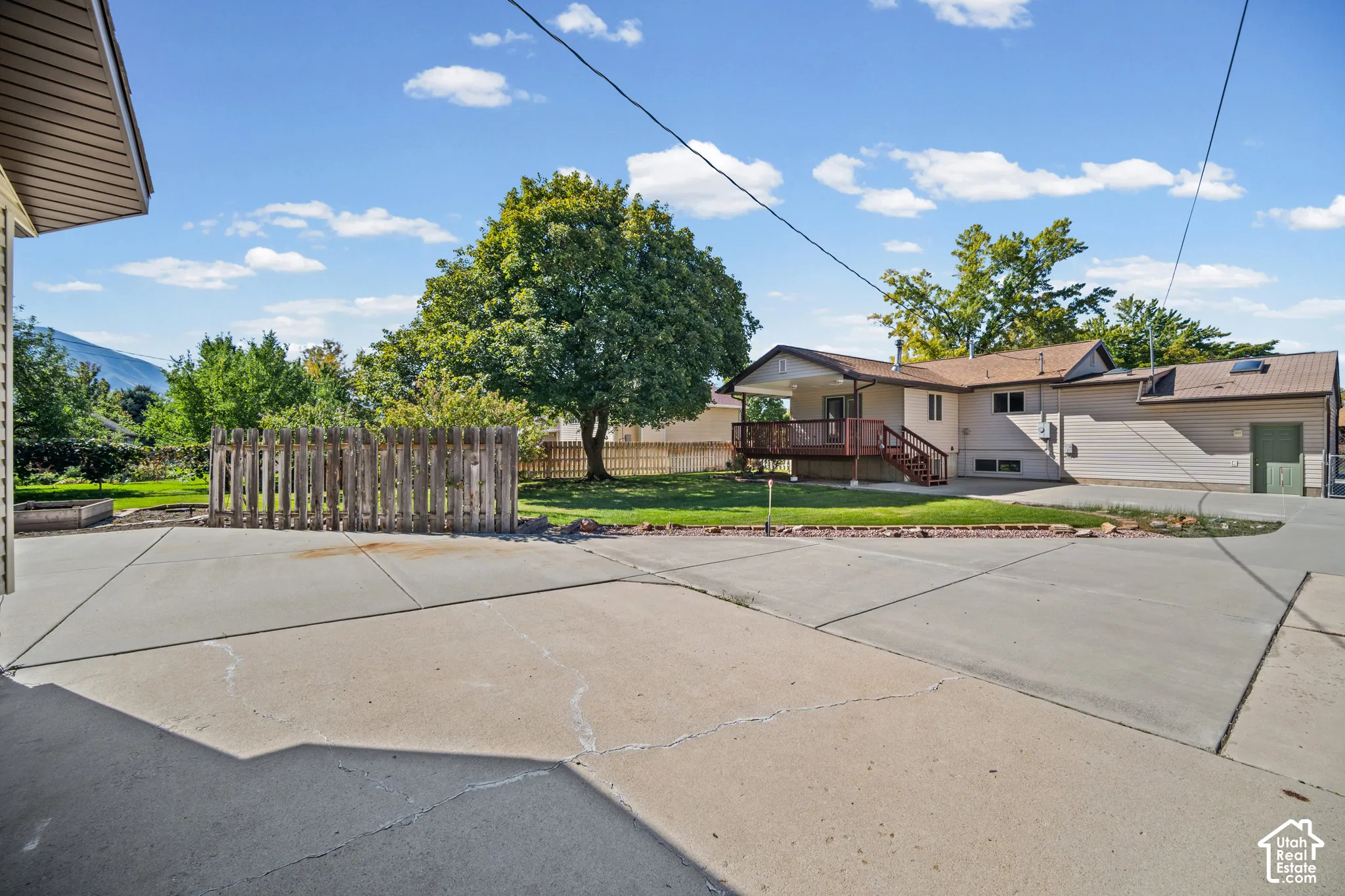 Expansive concrete driveway and courtyard area