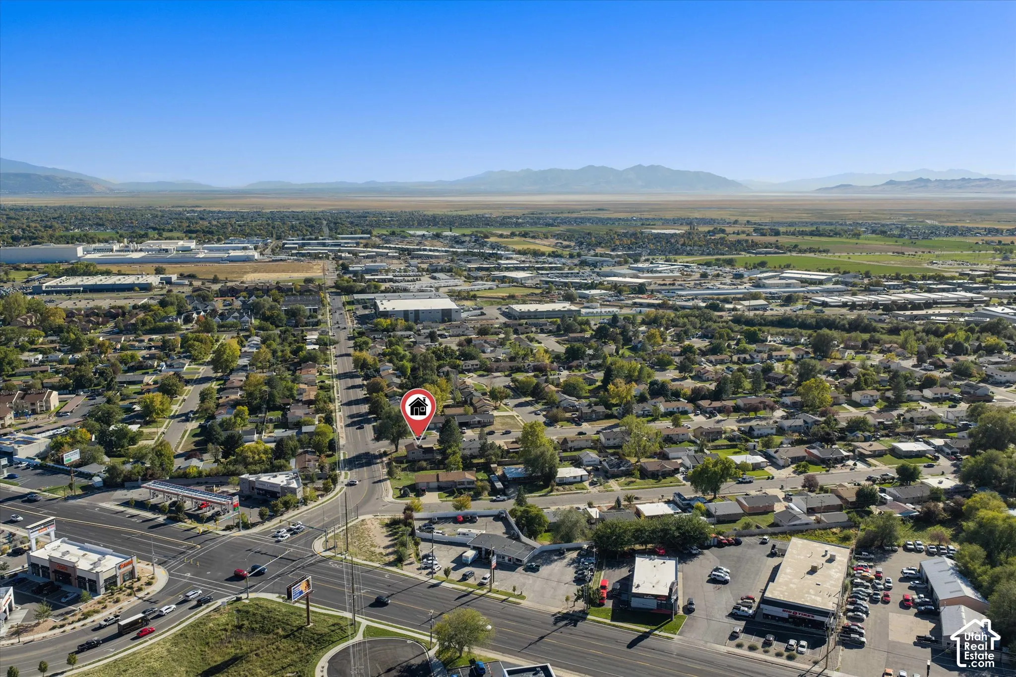 Aerial perspective of a residential area with varied commercial establishments