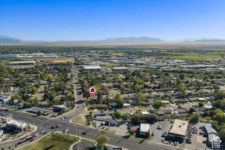 Aerial perspective of a residential area with varied commercial establishments