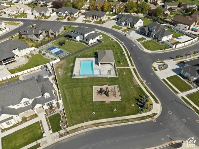 Community amenities featuring a swimming pool, covered lounge area, and playground
