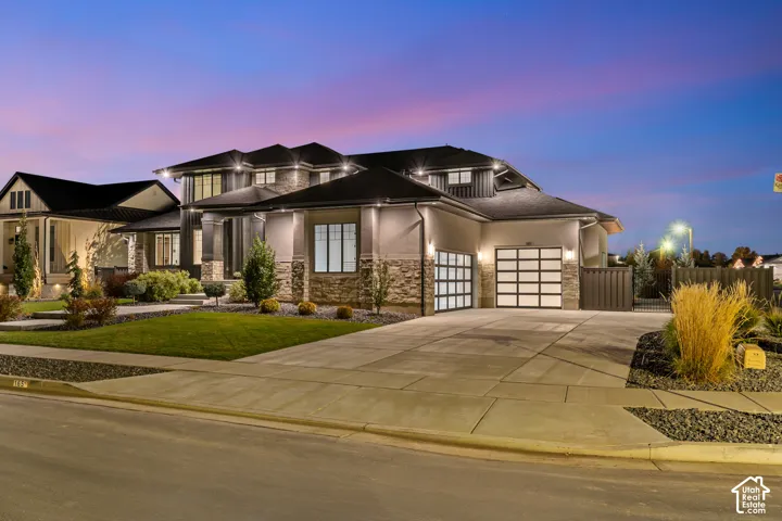 Contemporary architectural design featuring stone accents and stucco siding