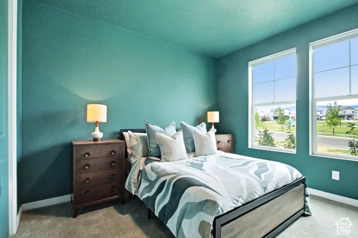 Two large windows provide ample natural light
