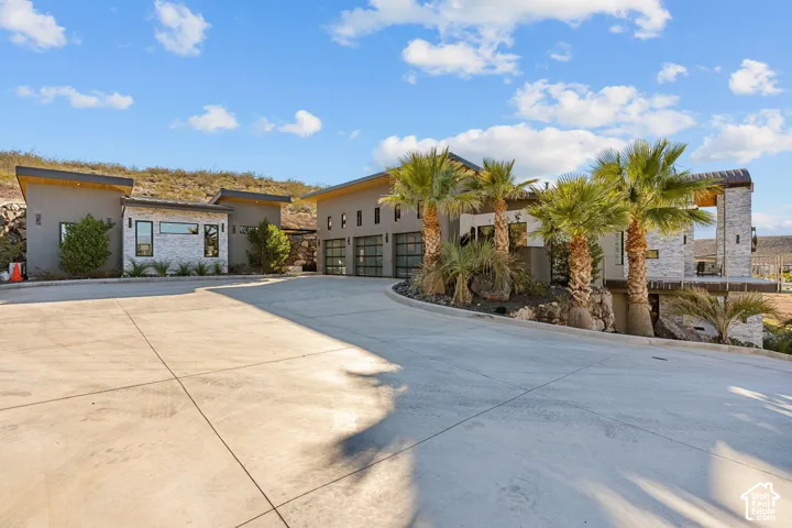 Modern exterior with varied stone and stucco finishes