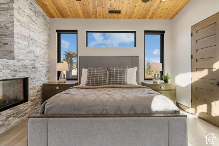 Wood-paneled ceiling with recessed lighting