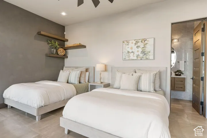 Recessed lighting, floating wood shelves, wood-finish flooring, and solid core door