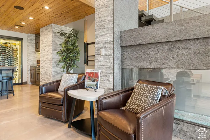 Wood-paneled ceiling with recessed lighting