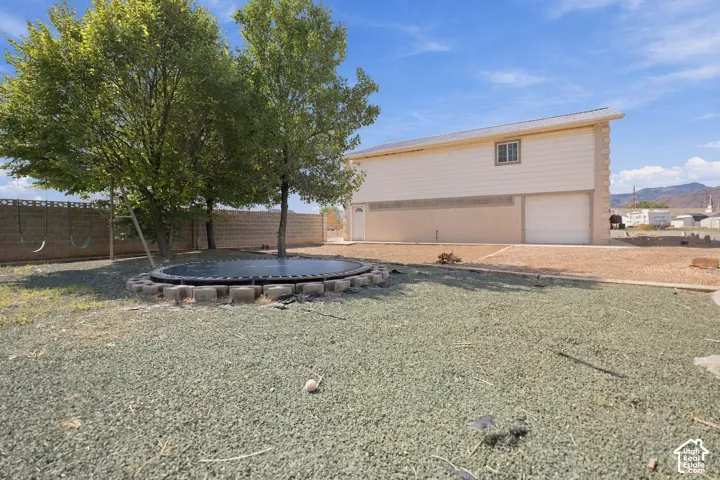 Gravel landscaping with mature trees