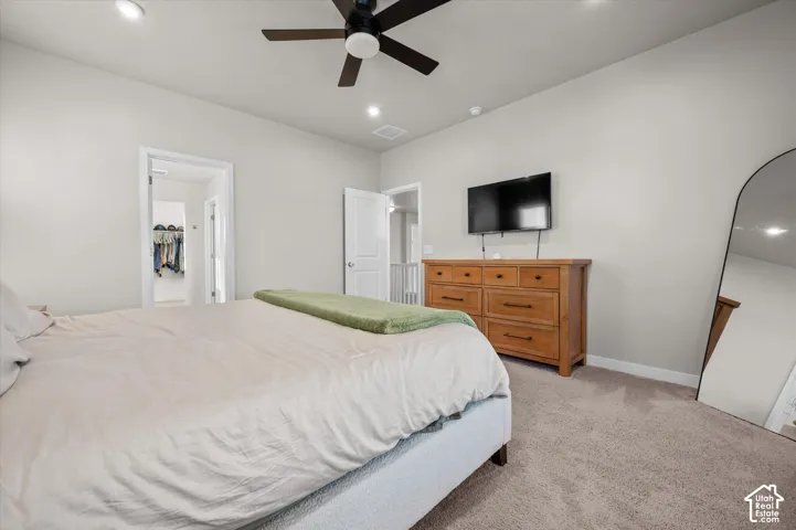 Carpeted flooring paired with neutral wall tones