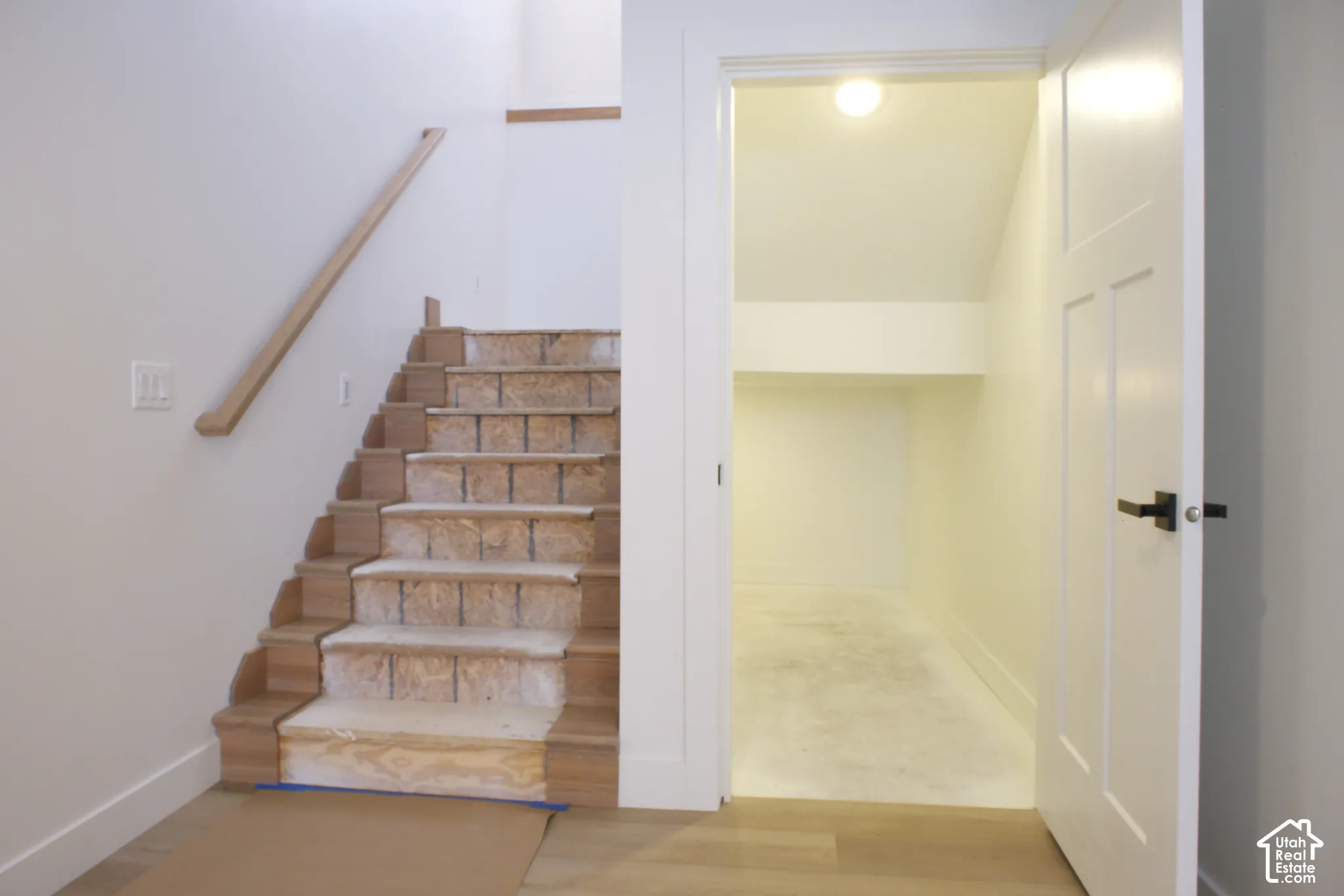 Hardwood stair treads with a matching handrail