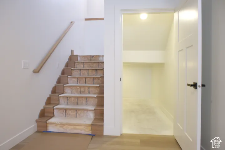 Hardwood stair treads with a matching handrail