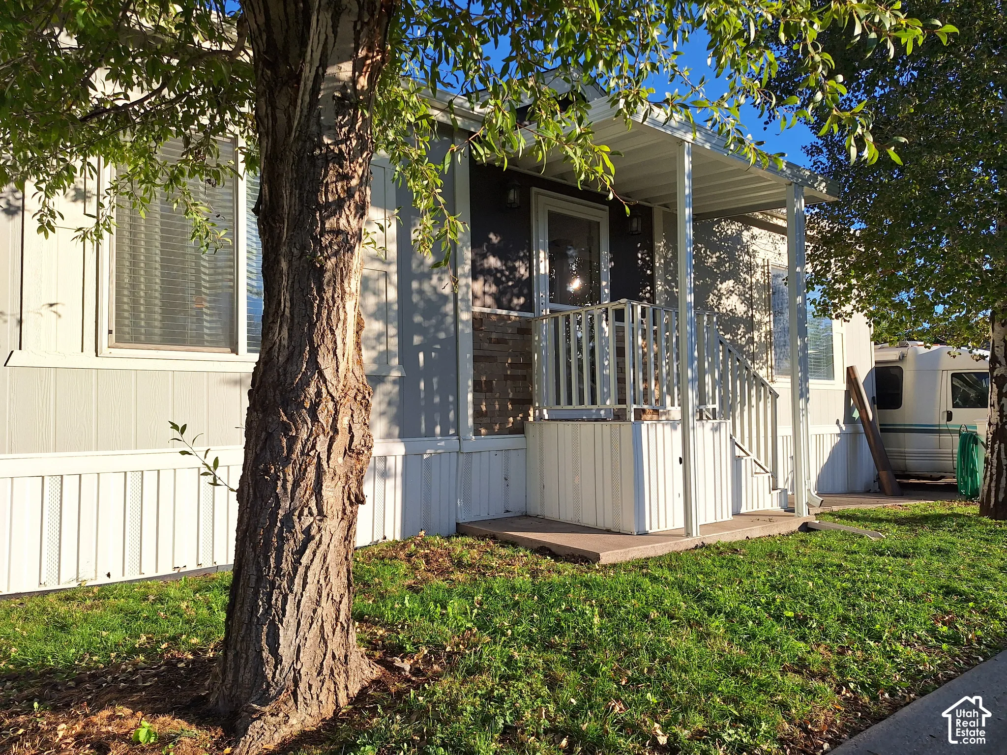 Front entry with covered porch and steps