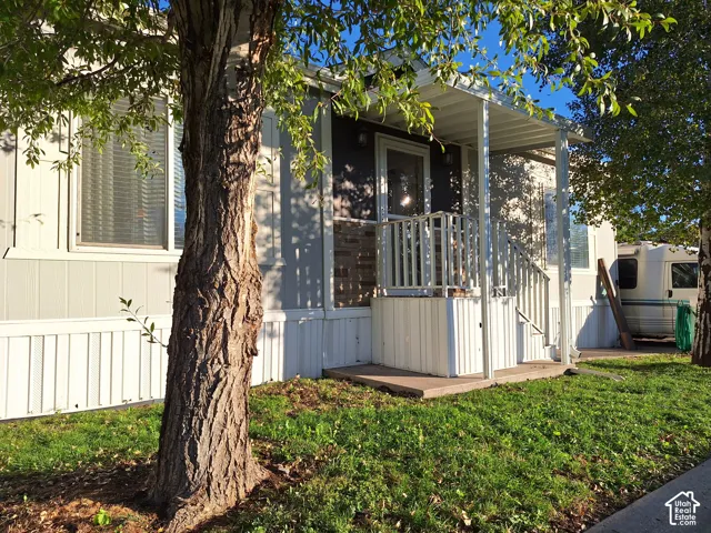 Front entry with covered porch and steps