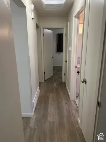 Wood-finish plank flooring throughout