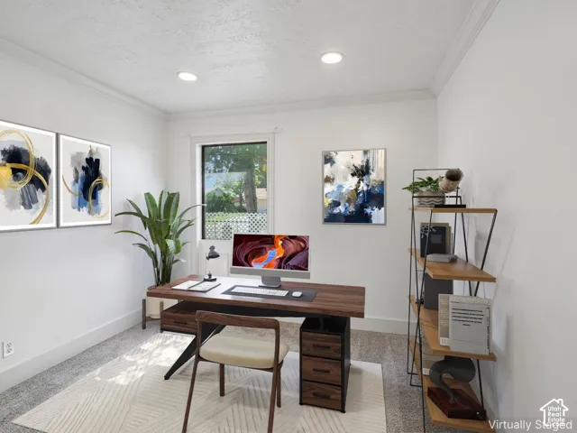 Recessed lighting, crown molding, and a window with natural light