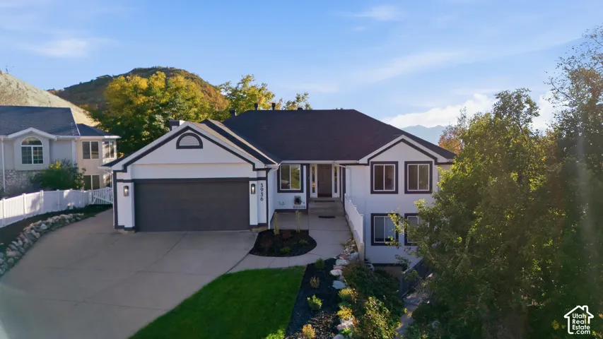 Modern exterior architecture featuring white siding and dark trim