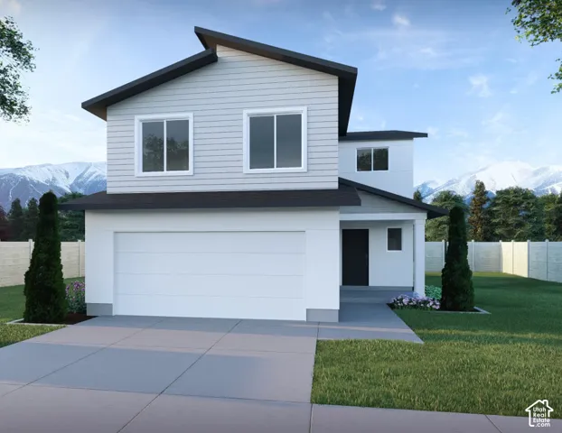 Modern exterior with a light-toned horizontal siding finish, a two-car garage, and a covered entry