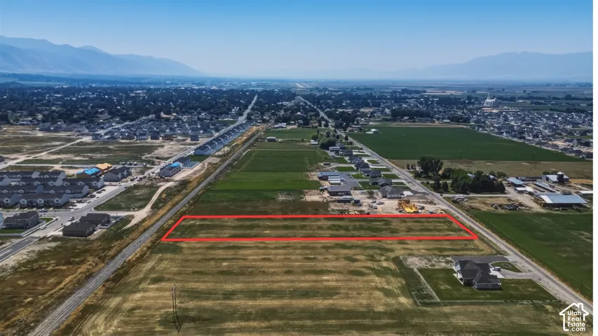 Expansive land parcel featuring open terrain and a clear boundary
