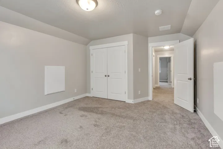 Neutral gray wall paint with white trim
