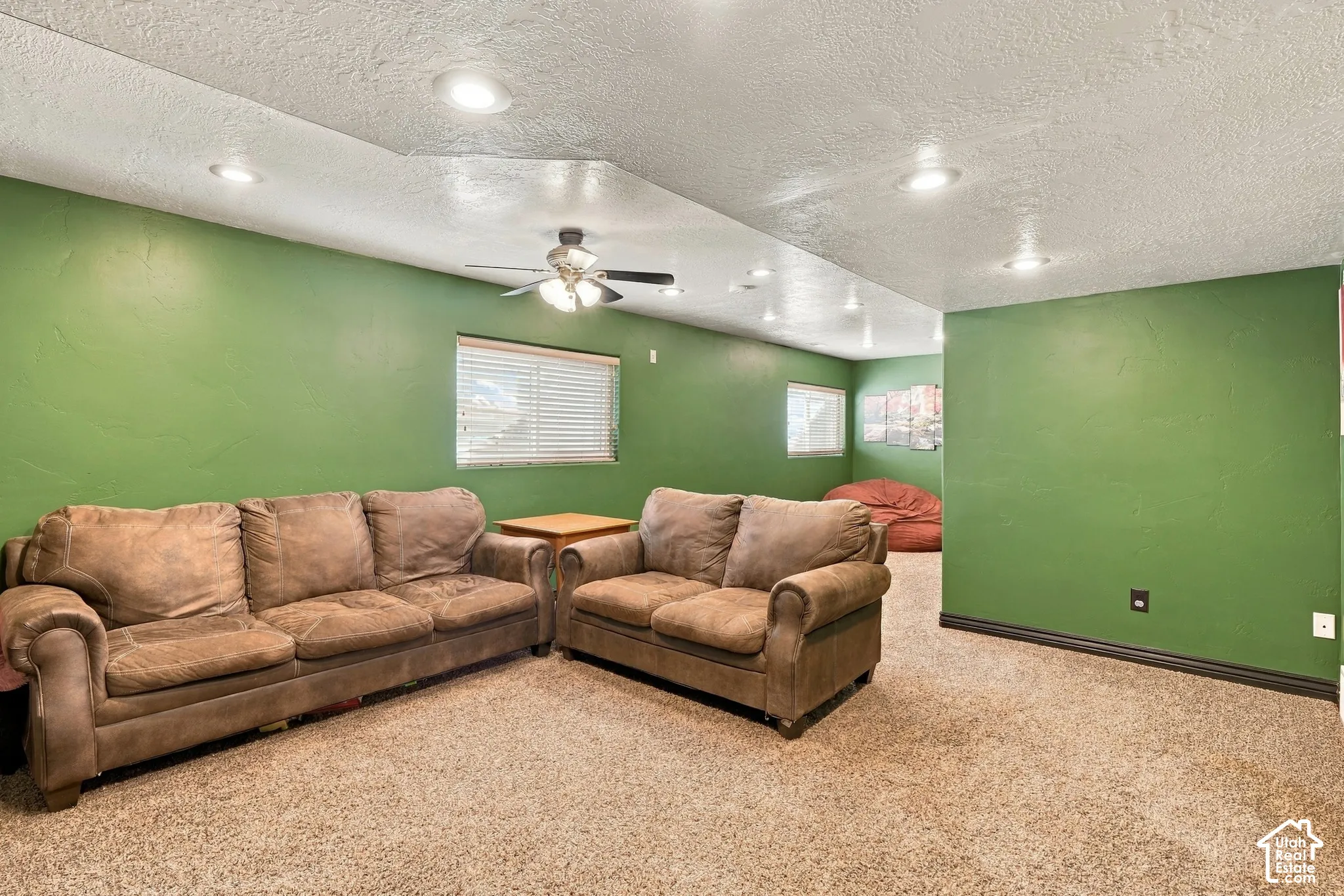 Recessed lighting and ceiling fan overhead