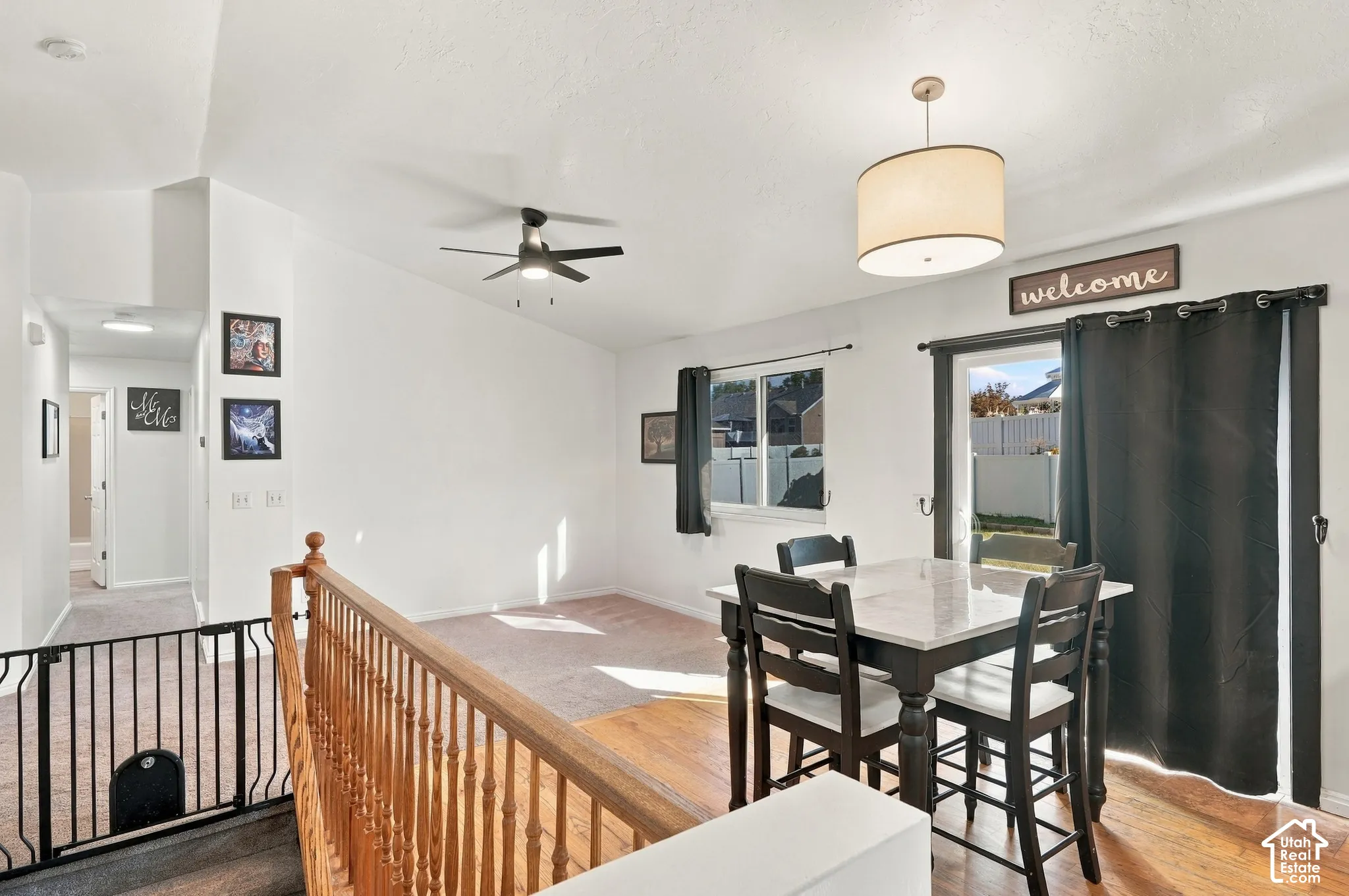 Vaulted ceilings and a ceiling fan in the main living space