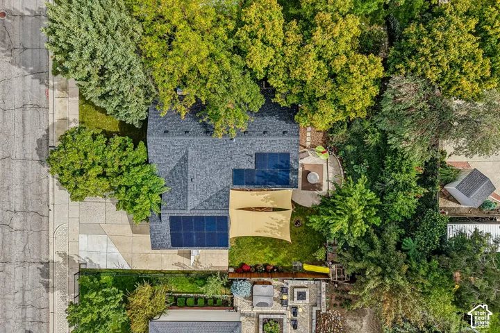 Shingled roof with multiple solar panel arrays