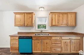 Wood-finish cabinetry with silver-tone hardware