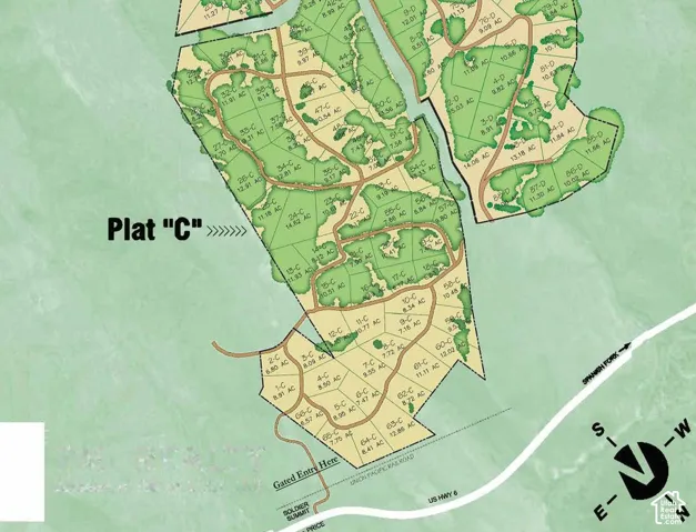 Plat Map. Illustrating the division of land into lots, including acreage and a directional compass