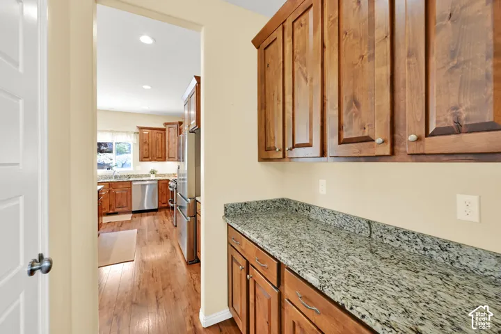 Wood-finish flooring throughout