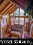 Property Image. Interior living area with vaulted ceiling and large window elements