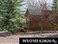 Property Listing Image. Exterior representation of the property, featuring surrounding vegetation