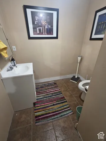 White ceramic sink with chrome faucet
