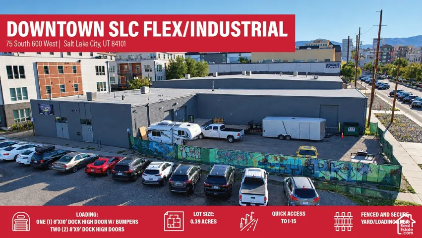 Industrial building featuring a gray exterior and a flat roof