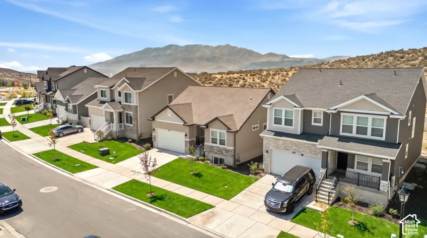 Newly constructed residential neighborhood with a mountain backdrop