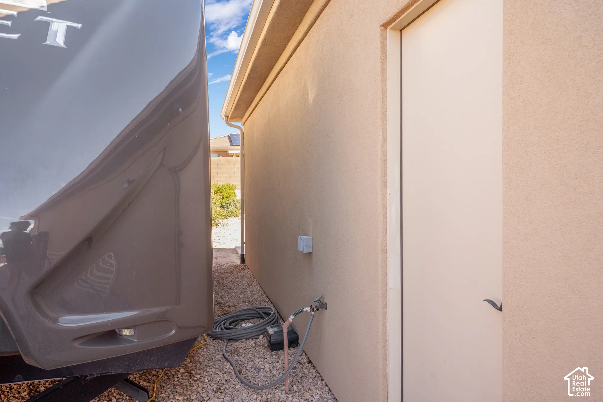 RV parking approx. 13' wide and 53' deep with 220 power and sewer dump