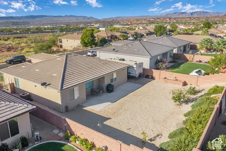 Desert landscaping with established plantings and a durable block wall perimeter