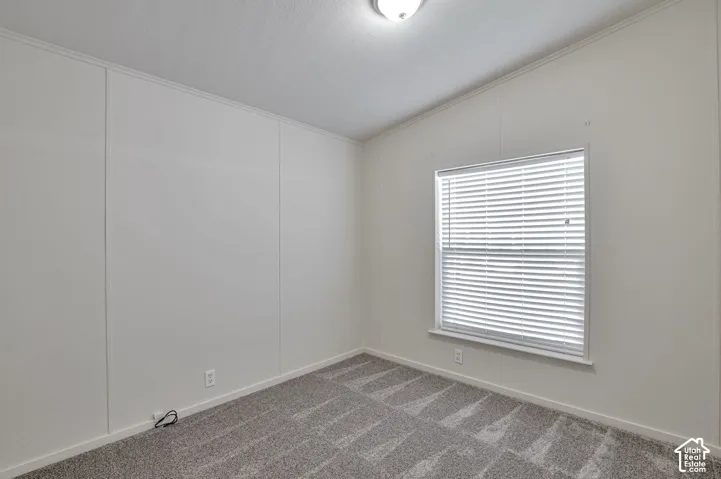 Wall-to-wall carpeting and neutral wall tones