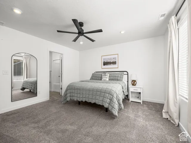 Recessed lighting, ceiling fan, carpet flooring, window with blinds, and white walls