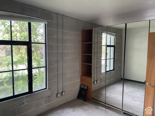 Concrete block walls with exposed conduit