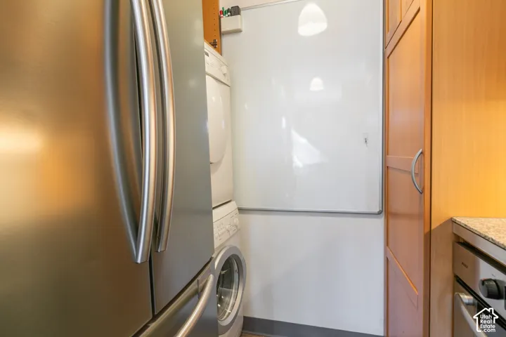 Stainless steel refrigerator with double doors and handles