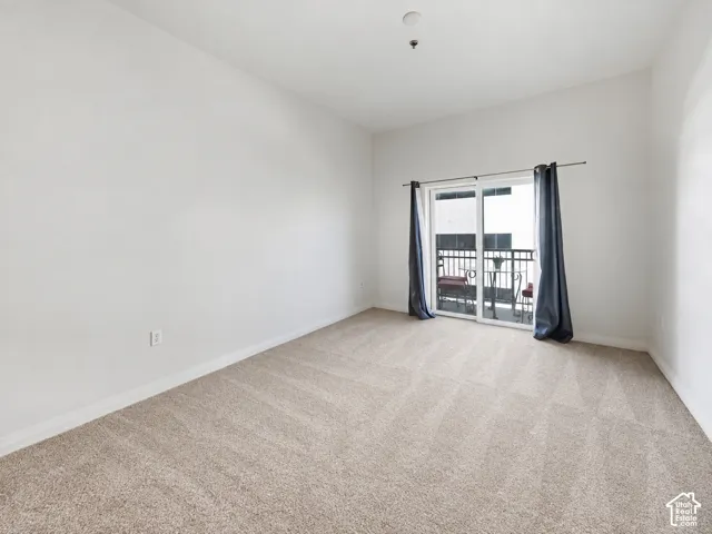 Brand New Neutral-toned carpet flooring and white walls