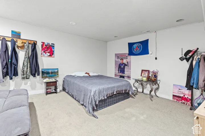 Wall-to-wall carpeting and recessed lighting